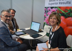 Brian Hendel and Carrie Izsak of IPM Scoutec at the table with Cem Samlimeshur of Delta Topraksiz.